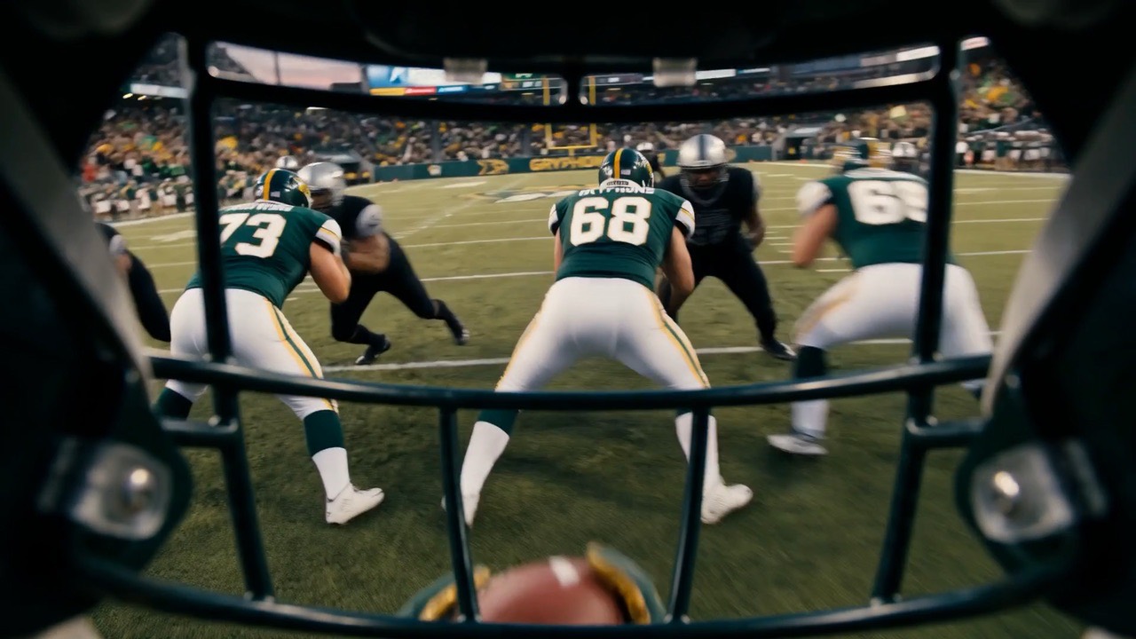 Gridiron motion study: the field seen from inside a football helmet.